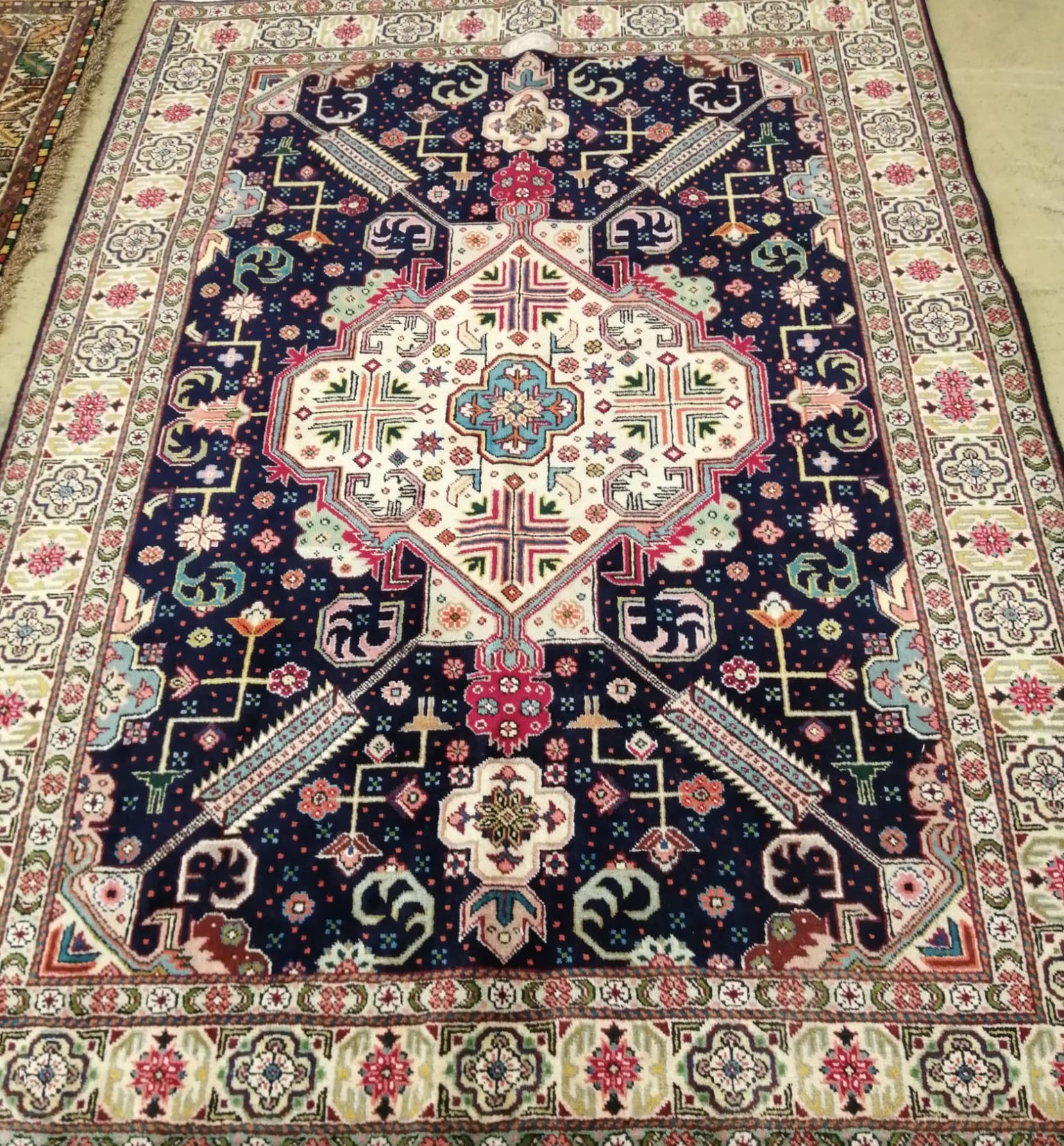 A Tabriz blue ground rug, 200 x 140cm